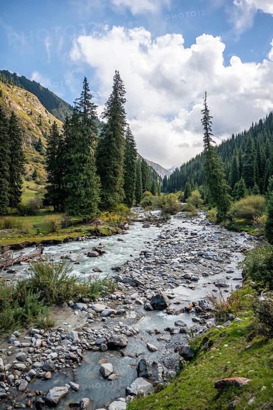 Green mountain valley with river and steep mountain peaks, Chong Kyzyl Suu Valley, Terskey Ala Too, Tien-Shan Mountains, Kyrgyzstan, Asia