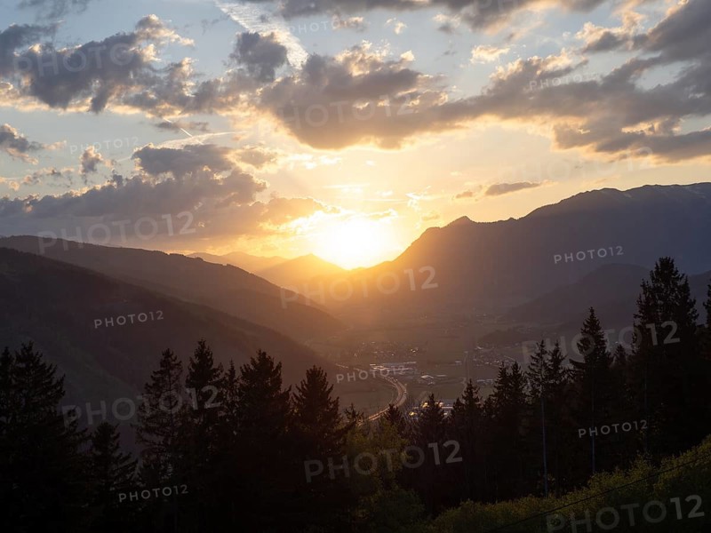 Sunset over the Liesingtal, in the evening light the village of Traboch, Schoberpass federal road, view from the lowlands, Leoben, Styria, Austria, Europe