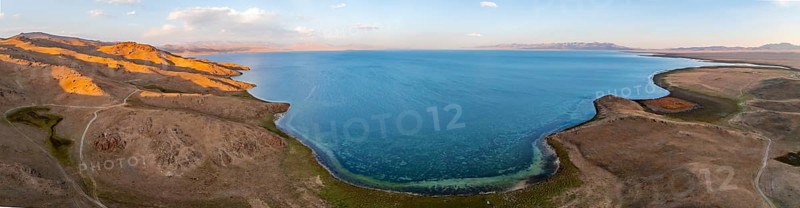 Aerial view, Vast empty landscape at the mountain lake Song Kul, Moldo Too Mountains, Naryn region, Kyrgyzstan, Asia