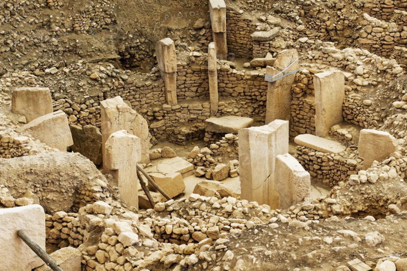Gobekli Tepe neolithic archaeological site dating from 10 millennium BC, Large circular structures with massive stone pillars, Potbelly Hill, Sanliurfa, Turkey, Asia