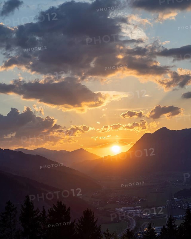 Sunset over the Liesingtal, in the evening light the village of Traboch, Schoberpass federal road, view from the lowlands, Leoben, Styria, Austria, Europe