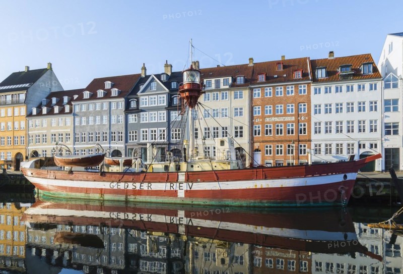 Moored Gedser Rev ship and colourful 17th century apartment buildings and houses along the Nyhavn canal, Copenhagen, Denmark, Europe