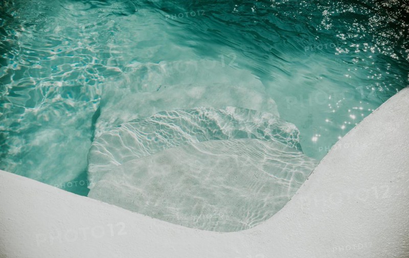 Design and detail of stairs of a home pool. Details of stairs of a home swimming pool