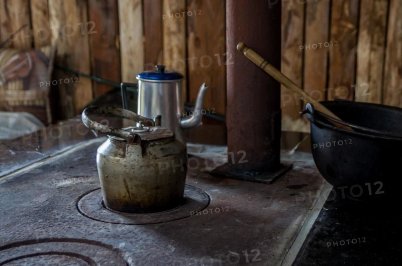 Beautiful steel kettle on wood stove in the countryside, Cambara do sul, Rio Grande do sul, Brazil, South America