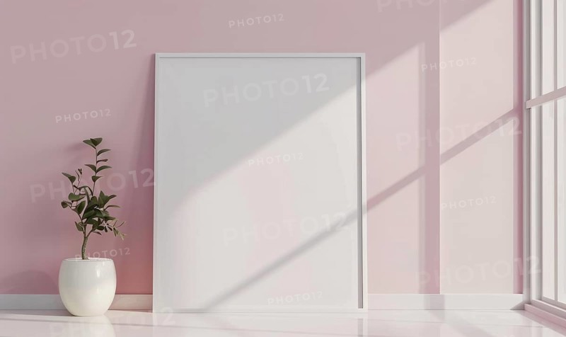 A blank image frame mockup on a soft blush pink wall in a minimalistic modern interior room AI generated