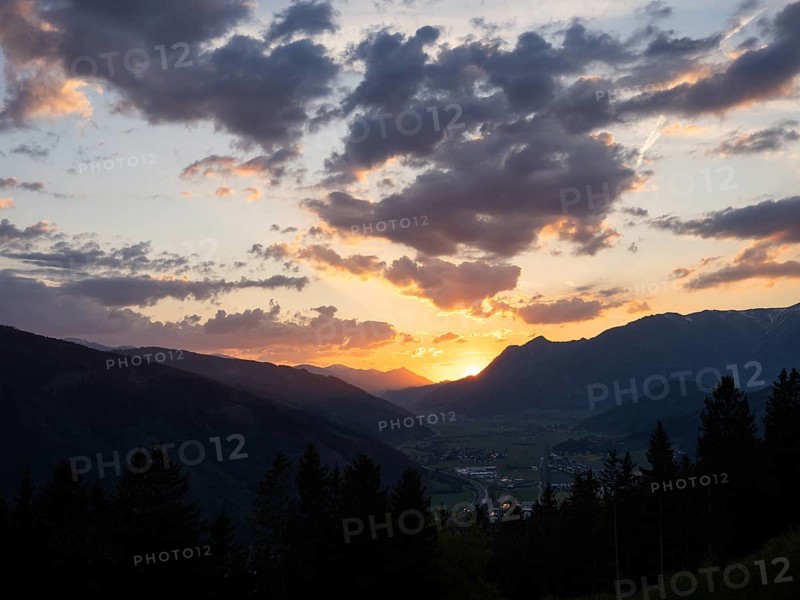Sunset over the Liesingtal, in the evening light the village of Traboch, Schoberpass federal road, view from the lowlands, Leoben, Styria, Austria, Europe