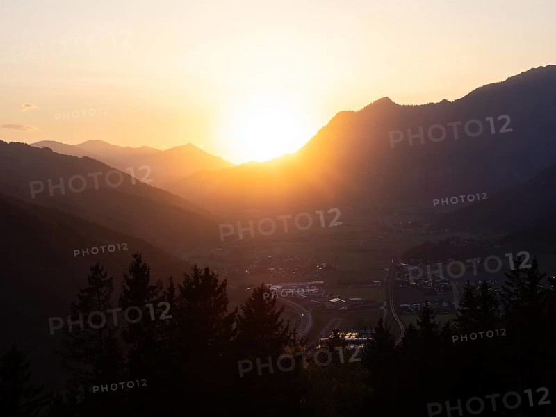 Sunset over the Liesingtal, in the evening light the village of Traboch, Schoberpass federal road, view from the lowlands, Leoben, Styria, Austria, Europe