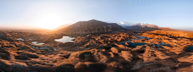 Atmospheric aerial view, high mountain landscape with glacier moraines and mountain lakes, behind Pik Lenin, Trans Alay Mountains, Pamir Mountains, Osher Province, Kyrgyzstan, Asia