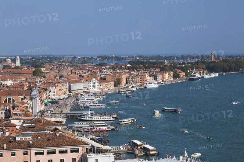 Water taxis and vaporettos along the Riva degli Schiavoni promenade plus old Renaissance architectural style residential buildings and palaces taken from the Campanile bell tower in St Mark's Square, San Marco, Venice, Veneto, Italy, Europe