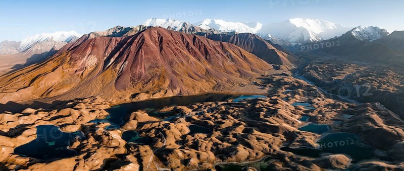 Aerial view, high mountain landscape with glacial moraines and mountain lakes, behind Pik Lenin, Trans Alay Mountains, Pamir Mountains, Osher Province, Kyrgyzstan, Asia
