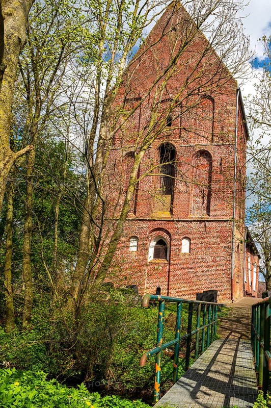Protestant Reformed Church in Suurhusen, famous leaning church tower, municipality of Hinte, district of Aurich, East Frisia, Lower Saxony, Germany, Europe