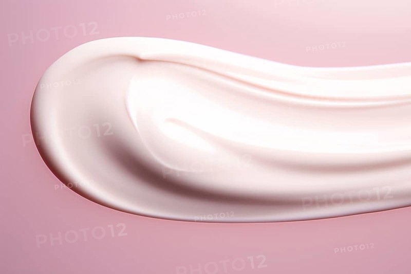 Smudge of white face cream on pink background. KI generiert, generiert, AI generated