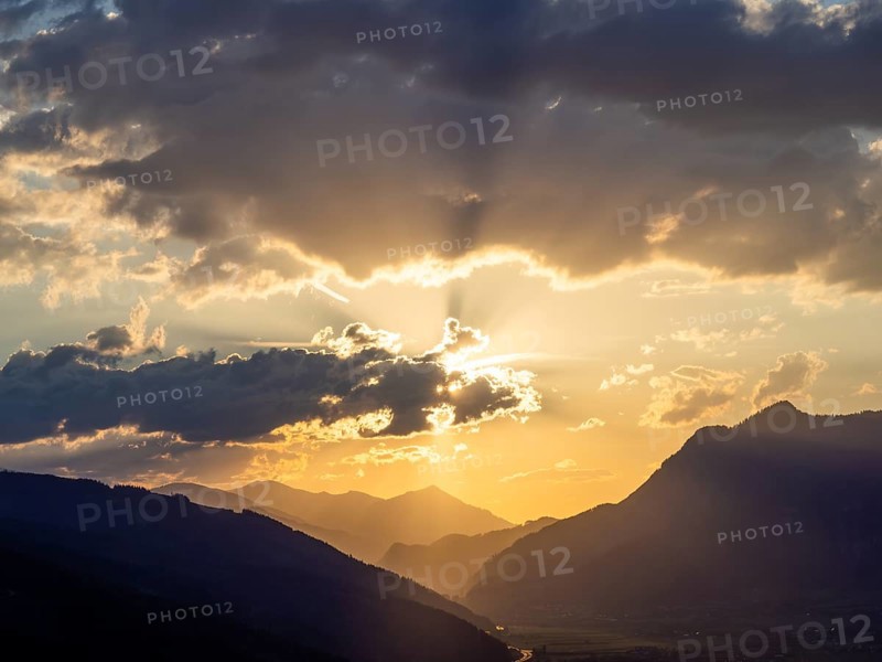 Sunset over the Liesingtal, in the evening light the village of Traboch, Schoberpass federal road, view from the lowlands, Leoben, Styria, Austria, Europe