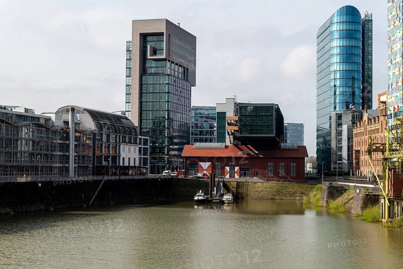 Left: Dock tower block, right: The Sign office tower block by architect Helmut Jahn, Duesseldorf Media Harbour, North Rhine-Westphalia, Germany, Europe
