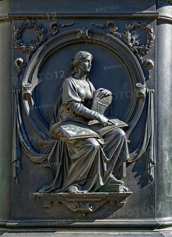 Pedestal sculpture on the monument to Gottfried Wilhelm Leibniz, inner courtyard of Leipzig University, Leipzig, Saxony, Germany, Europe