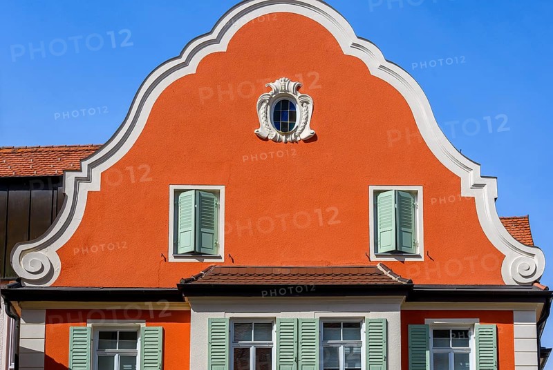 Red facade with tail gable, Kaufbeuern, Allgaeu, Swabia, Bavaria, Germany, Europe