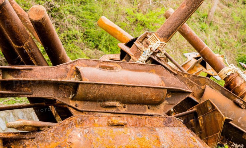 Closeup of large rusted metal anchor used on large fishing vessels in South Korea