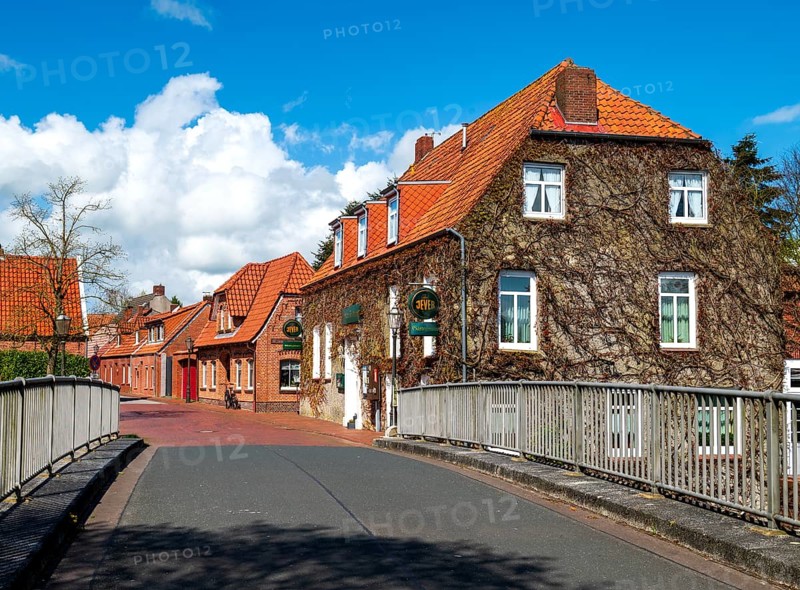Bridge road over the Knockster Tief in the village of Hinte, district of Aurich, East Frisia, Lower Saxony, Germany, Europe