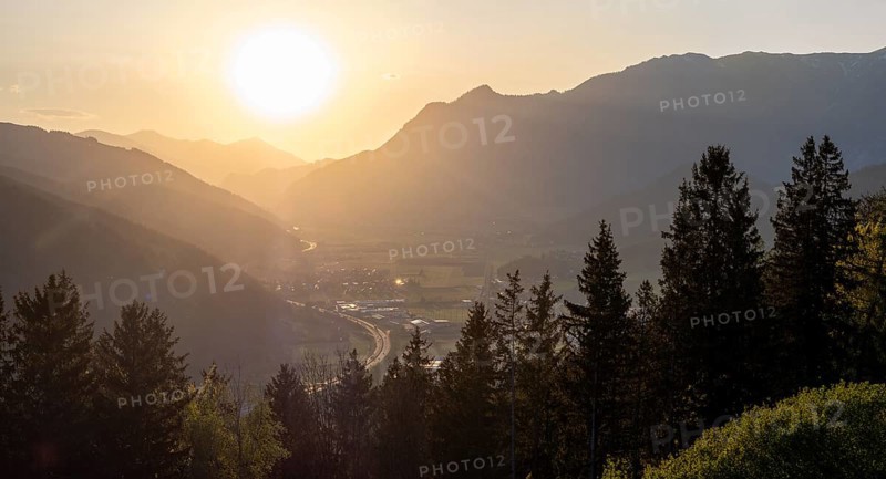 Evening light at sunset over the Liesingtal, in the evening light the village of Traboch, Schoberpass federal road, panoramic shot, view from the lowlands, Leoben, Styria, Austria, Europe