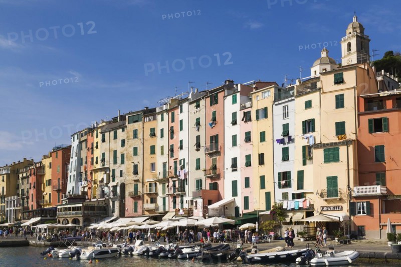Harbour with fishing boats and colourful apartment building facades at Portovenere, La Spezia province, Italy, Europe