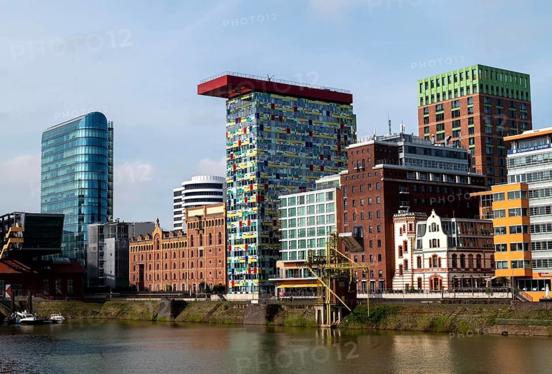 Left, office tower The Sign by architect Helmut Jahn, centre Colorium by architect William Allen Alsop, Duesseldorf Media Harbour, North Rhine-Westphalia, Germany, Europe
