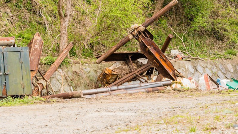 Closeup of large rusted metal anchor used on large fishing vessels in NamHae, South Korea, Asia