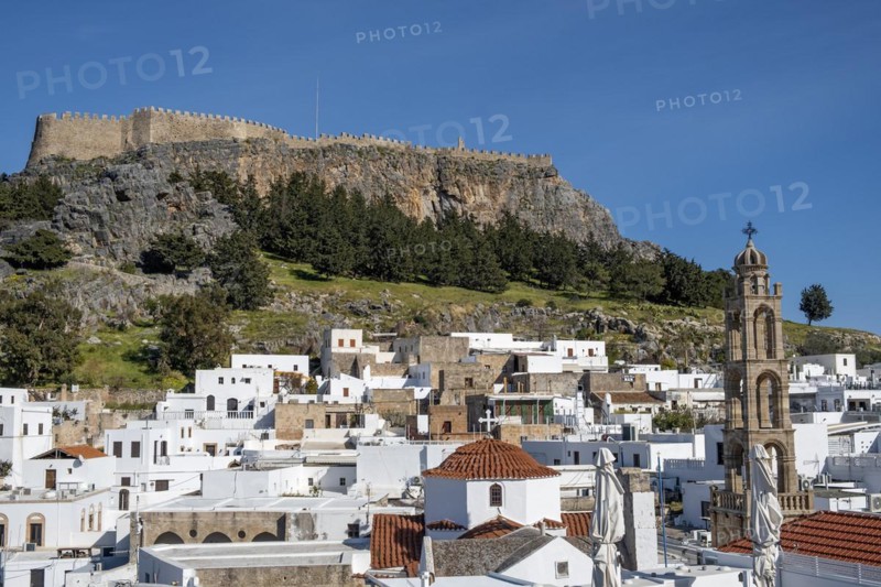 View of the Acropolis and the white houses of Lindos, Rhodes, Dodecanese archipelago, Greek Islands, Greece, Europe