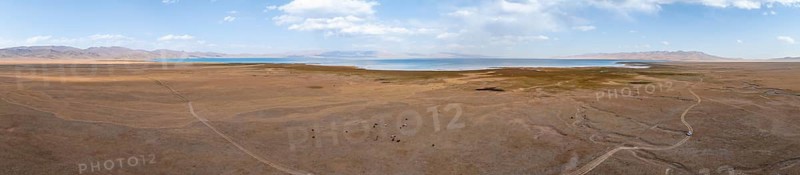Aerial view, Vast empty landscape at the mountain lake Song Kul in autumn, Moldo Too Mountains, Naryn region, Kyrgyzstan, Asia