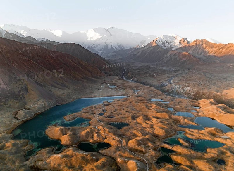 Aerial view, high mountain landscape with glacial moraines and mountain lakes, behind Pik Lenin, Trans Alay Mountains, Pamir Mountains, Osher Province, Kyrgyzstan, Asia