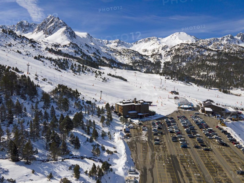 Aerial view of a car park at a ski resort with mountain scenery in the background, Grau Roig, Encamp, Andorra, Pyrenees, Europe