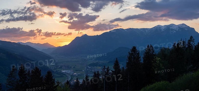 Sunset over the Liesingtal, in the valley the village of Traboch, panoramic shot, Schoberpass federal road, view from the lowlands, Leoben, Styria, Austria, Europe