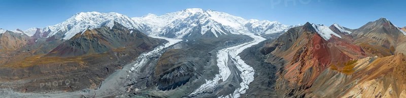 Aerial view, panorama, high mountain landscape with glacier moraines and glacier tongues, glaciated and snow-covered mountain peaks, Lenin Peak and Peak of the XIX Party Congress of the CPSU, Traveller's Pass, Trans Alay Mountains, Pamir Mountains, Osher Province, Kyrgyzstan, Asia