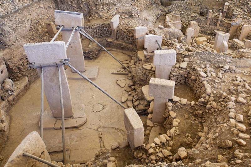 Gobekli Tepe neolithic archaeological site dating from 10 millennium BC, Large circular structures with massive stone pillars, Potbelly Hill, Sanliurfa, Turkey, Asia