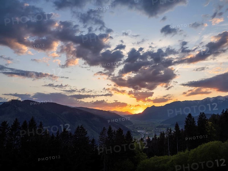 Sunset over the Liesingtal, in the evening light the village of Traboch, Schoberpass federal road, view from the lowlands, Leoben, Styria, Austria, Europe