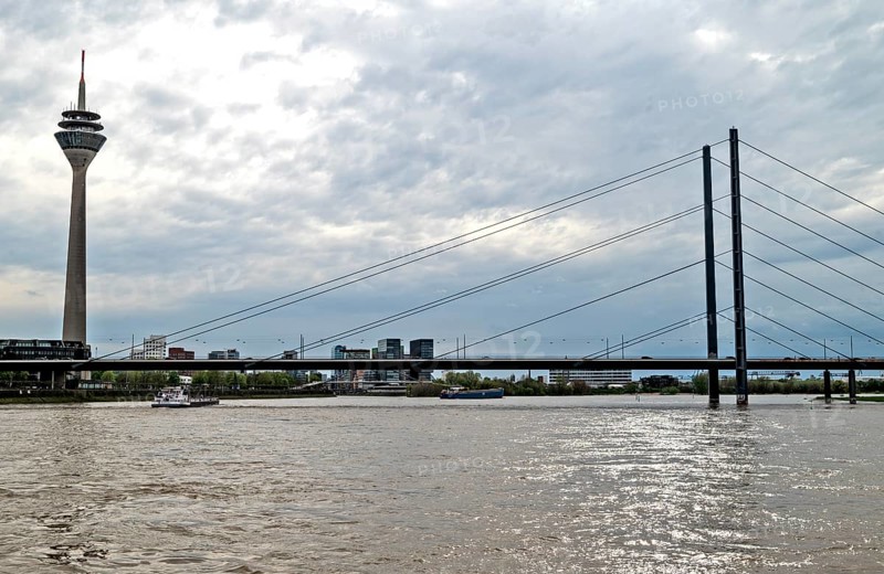 Rheinpromenade, view of Rheinkniebruecke, and Rheinturm Duesseldorf, North Rhine-Westphalia, Germany, Europe