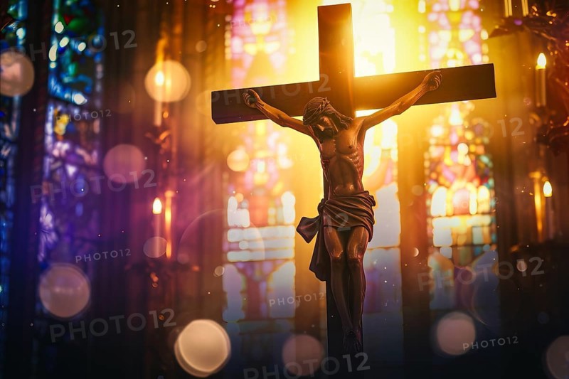 Crucifix with Jesus Christ on cross in church with light coming through stained glass windows, symbol of christian faith religion, AI generated
