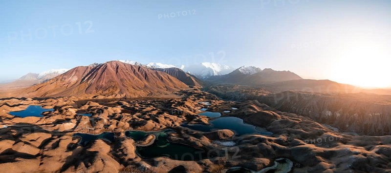 Atmospheric aerial view, high mountain landscape with glacier moraines and mountain lakes, behind Pik Lenin, Trans Alay Mountains, Pamir Mountains, Osher Province, Kyrgyzstan, Asia