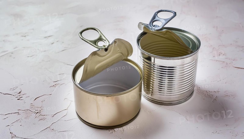 Symbol photo, two empty open cans on a white surface, AI generated, AI generated
