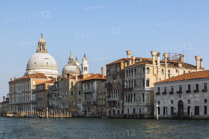 Grand Canal with Renaissance architectural style palace buildings and Santa Maria della Salute basilica, Dorsoduro, Venice, Veneto, Italy, Europe