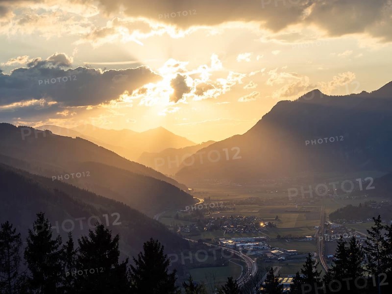 Sunset over the Liesingtal, in the evening light the village of Traboch, Schoberpass federal road, view from the lowlands, Leoben, Styria, Austria, Europe