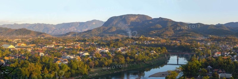 Panorama over Luang Prabang with Nam Khan River and Wat Phol Pao in the background, Laos, Asia