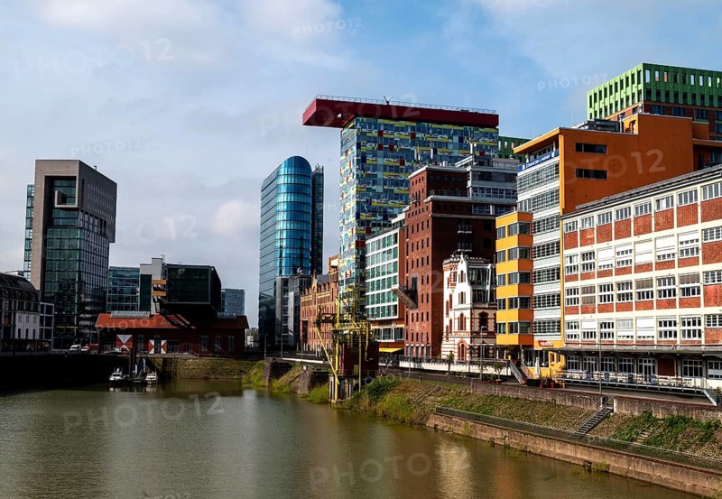 Dock high-rise on the left, The Sign office tower (Helmut Jahn) in the centre, Colorium by architect William Allen Alsop in the centre right, Duesseldorf Media Harbour, North Rhine-Westphalia, Germany, Europe