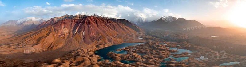 Atmospheric aerial view, high mountain landscape with glacier moraines and mountain lakes, behind Pik Lenin, Trans Alay Mountains, Pamir Mountains, Osher Province, Kyrgyzstan, Asia