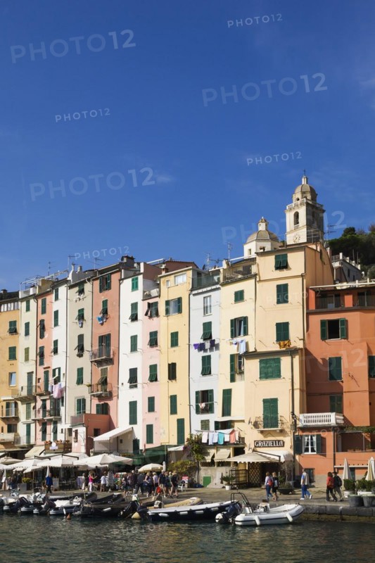 Harbour with small boats and colourful apartment building facades at Portovenere, La Spezia province, Italy, Europe
