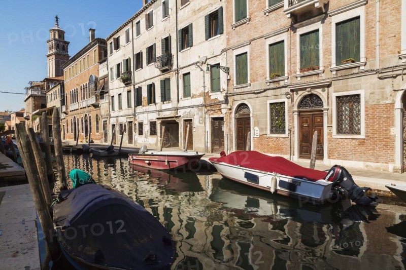 Narrow canal with moored boats and Renaissance architectural style residential palace buildings, Dorsoduro district, Venice, Veneto, Italy, Europe