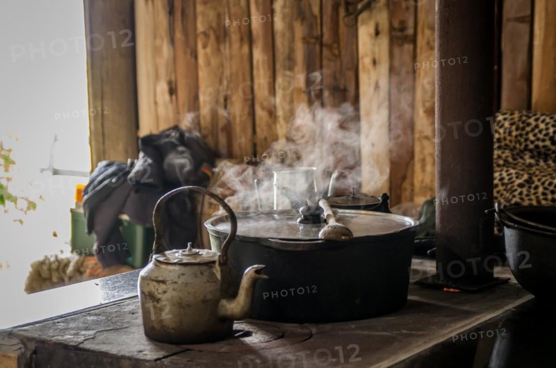 Beautiful steel kettle on wood stove in the countryside, Cambara do sul, Rio Grande do sul, Brazil, South America