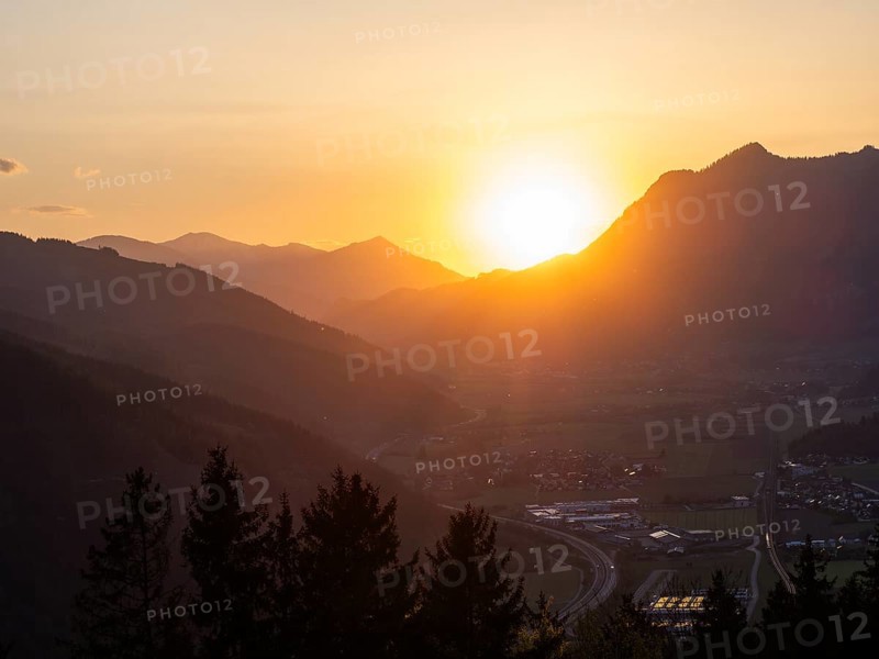 Sunset over the Liesingtal, in the evening light the village of Traboch, Schoberpass federal road, view from the lowlands, Leoben, Styria, Austria, Europe