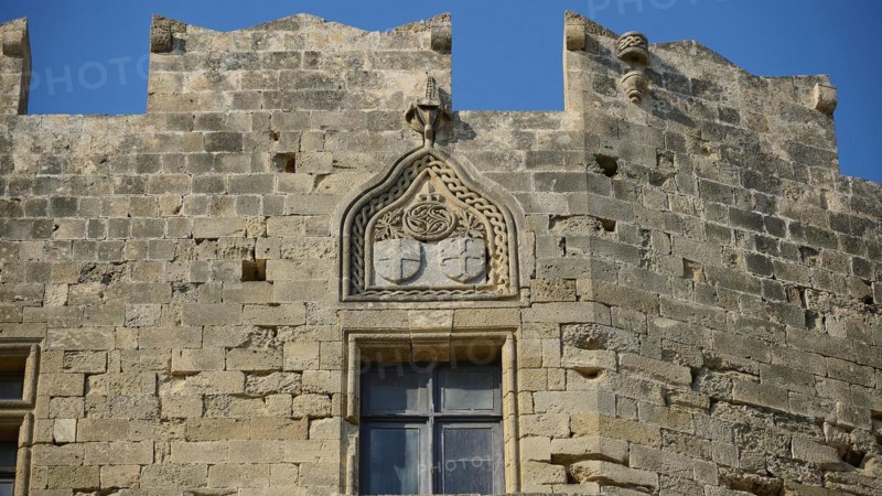 Castle house with coat of arms, Grand Master Antonio Fluvian de la Riviere, detailed view, St John's Church, Gothic carvings on a historic stone building, St John's Fortress, Lindos, Rhodes, Dodecanese, Greek Islands, Greece, Europe