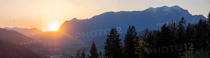 Sunset over the Liesingtal, in the evening light the village of Traboch, Schoberpass federal road, panoramic shot, view from the lowlands, Leoben, Styria, Austria, Europe