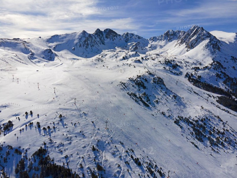 Aerial view of a snow-covered ski resort with mountains in the background, Grau Roig, Encamp, Andorra, Pyrenees, Europe